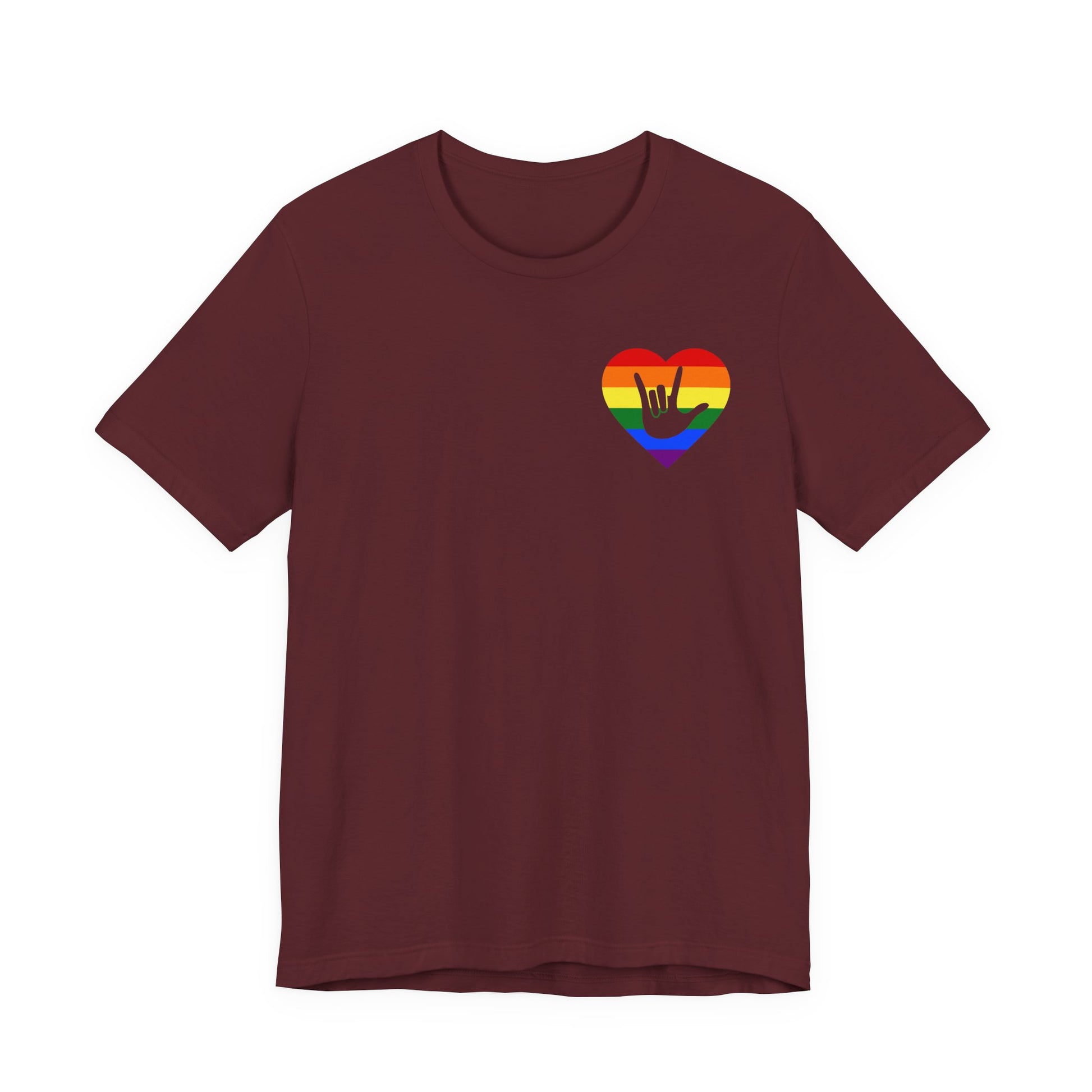 Front view of a maroon T-Shirt showing a pride coloured heart and the iconic ASL I Love You sign embedded in it on the left side of the chest