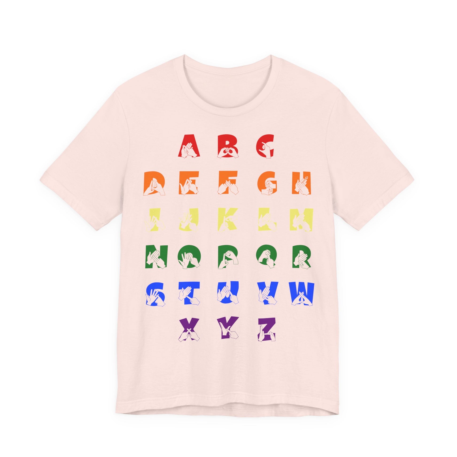 Front view of a soft pink t-shirt with BSL Alphabet - Pride Fingerspelling & Text