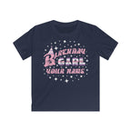 Navy kids' t-shirt with the phrase "Birthday Girl" in colourful text, a party hat on the letter B, stars surrounding the phrase, and a customisable name section below.