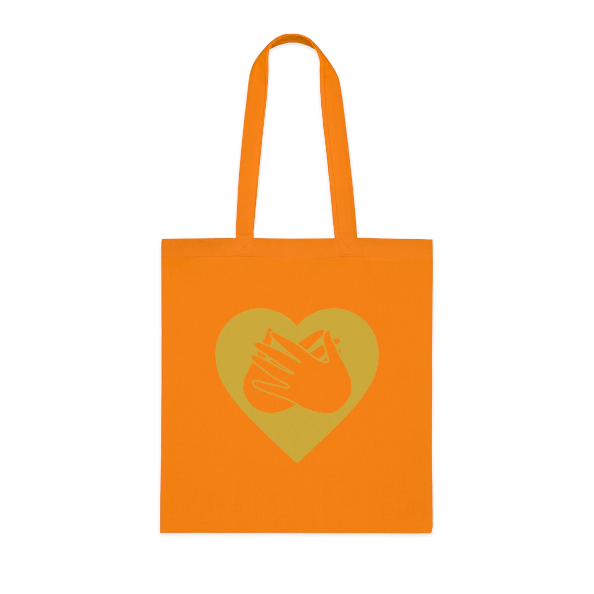 Orange Tote Bag showing a gold coloured heart and the iconic BSL Love sign embedded in it