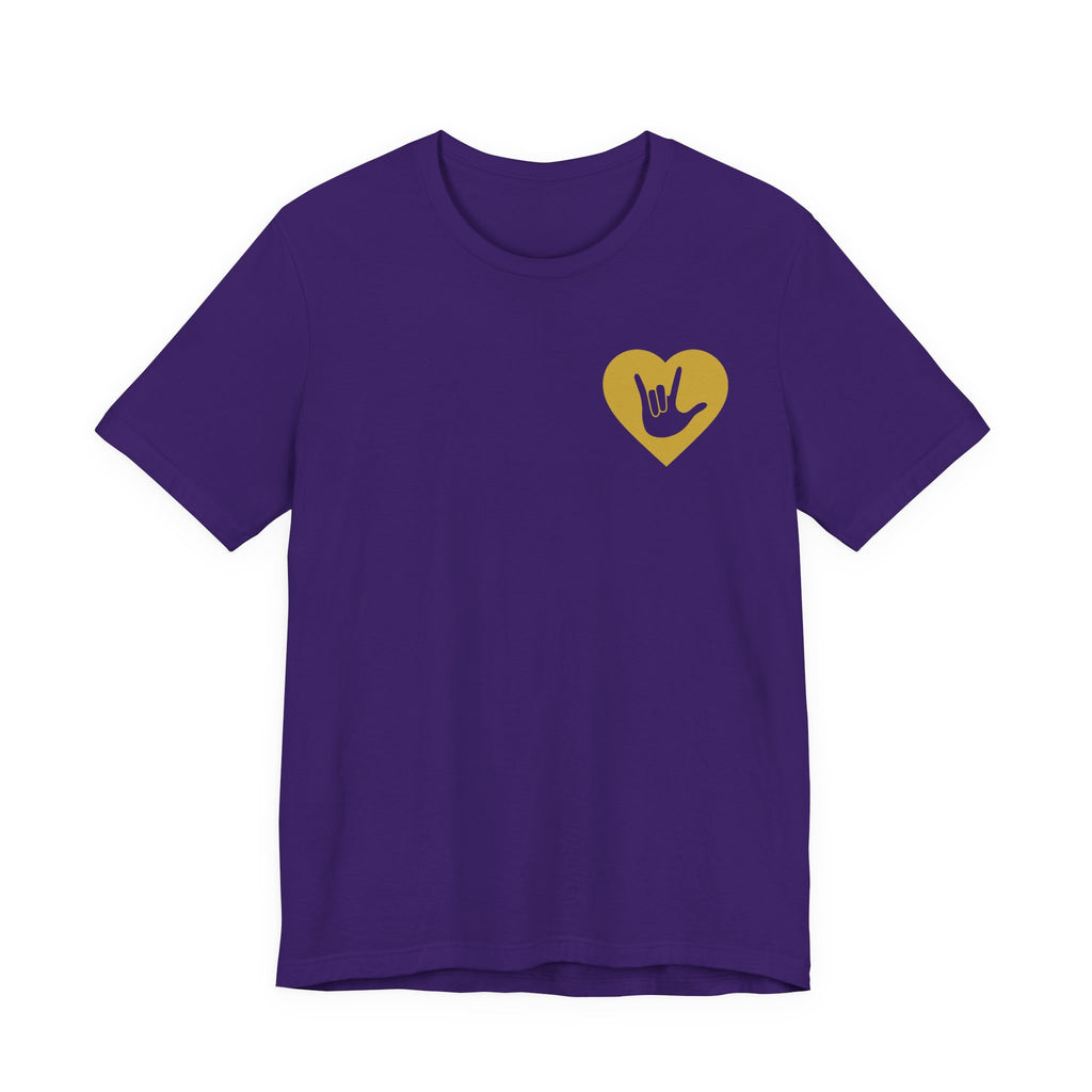 Front view of a team purple T-Shirt showing a gold coloured heart and the iconic ASL I Love You sign embedded in it on the left side of the chest