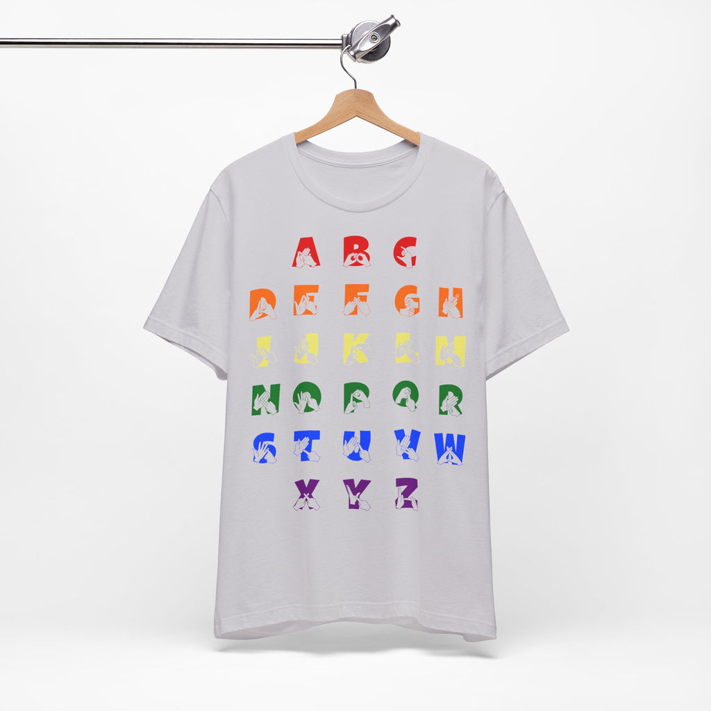 Front view of a lavender dust t-shirt with BSL Alphabet - Pride Fingerspelling & Text, on a hanger against a white background