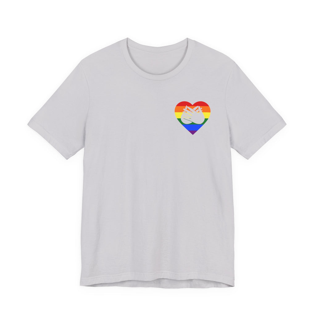 Front view of a lavender dust T-Shirt showing a pride coloured heart and the iconic BSL Love sign embedded in it on the left side of the chest