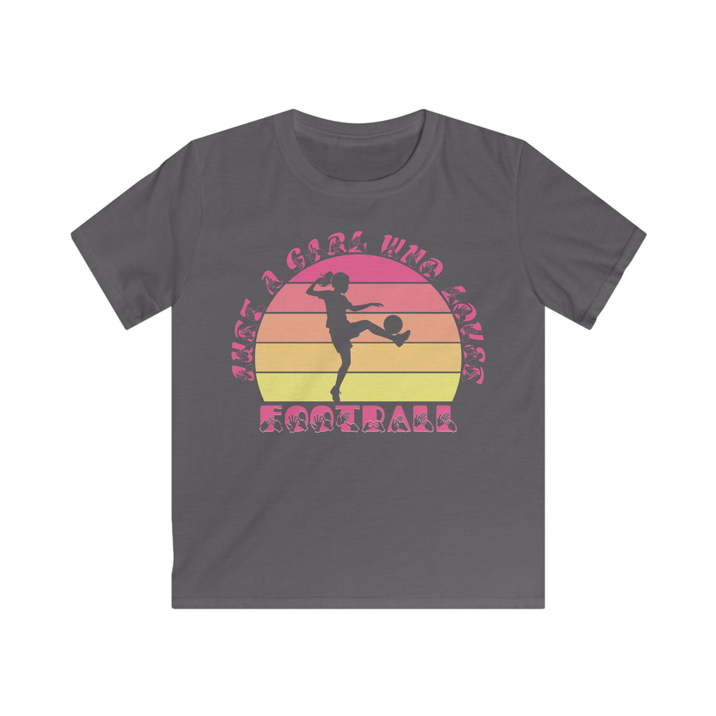 Charcoal t-shirt with the phrase "Just a Girl Who Loves Football" in BSL Fingerspelling and text featuring a colourful retro sunset and a silhouette of a boy kicking a football.