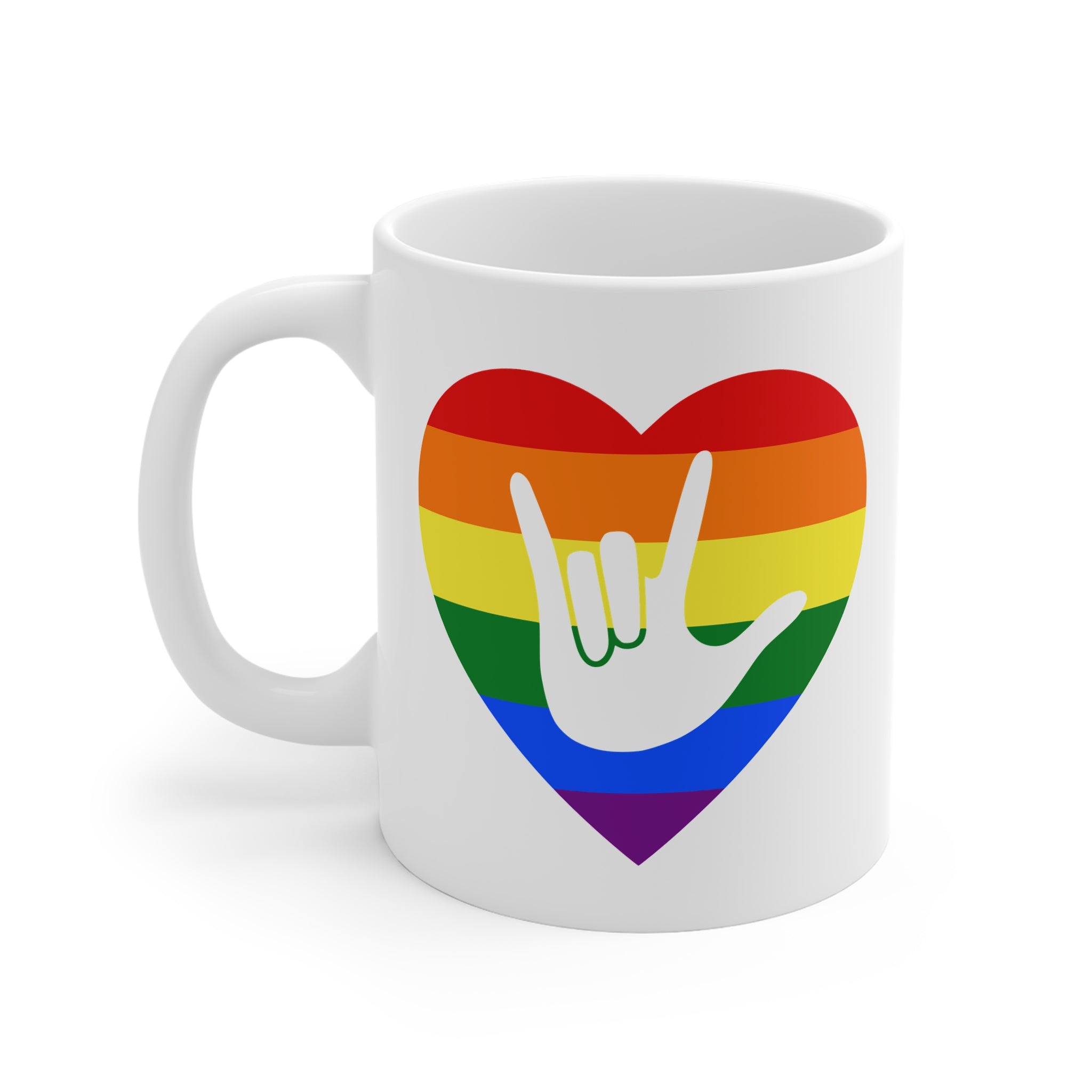 White mug with a pride coloured heart design featuring the ASL sign for I Love You embedded in it. The mug handle is on the right hand side of the mug.