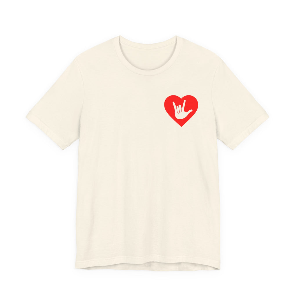 Front view of a natural T-Shirt showing a red coloured heart and the iconic ASL I Love You sign embedded in it on the left side of the chest