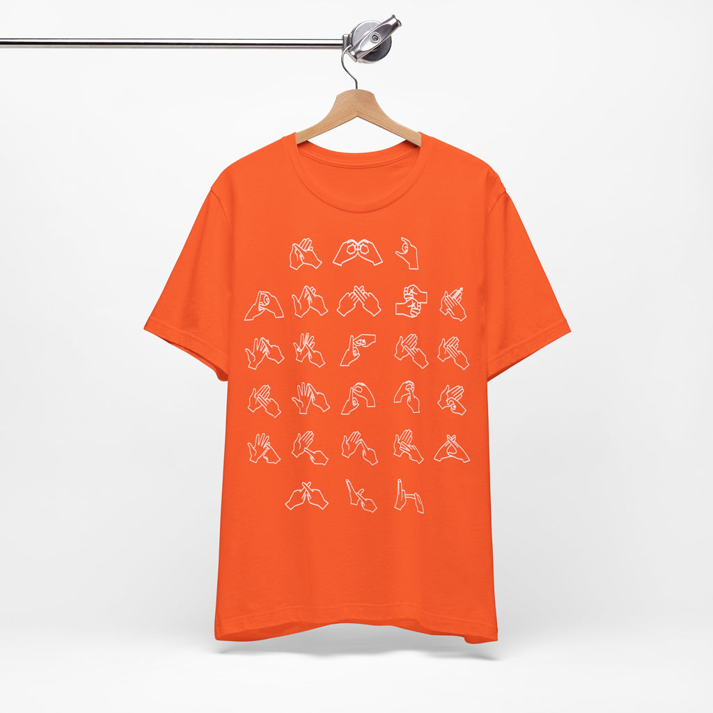 Front view of a orange t-shirt with BSL Alphabet - White Fingerspelling,  on a hanger against a white background