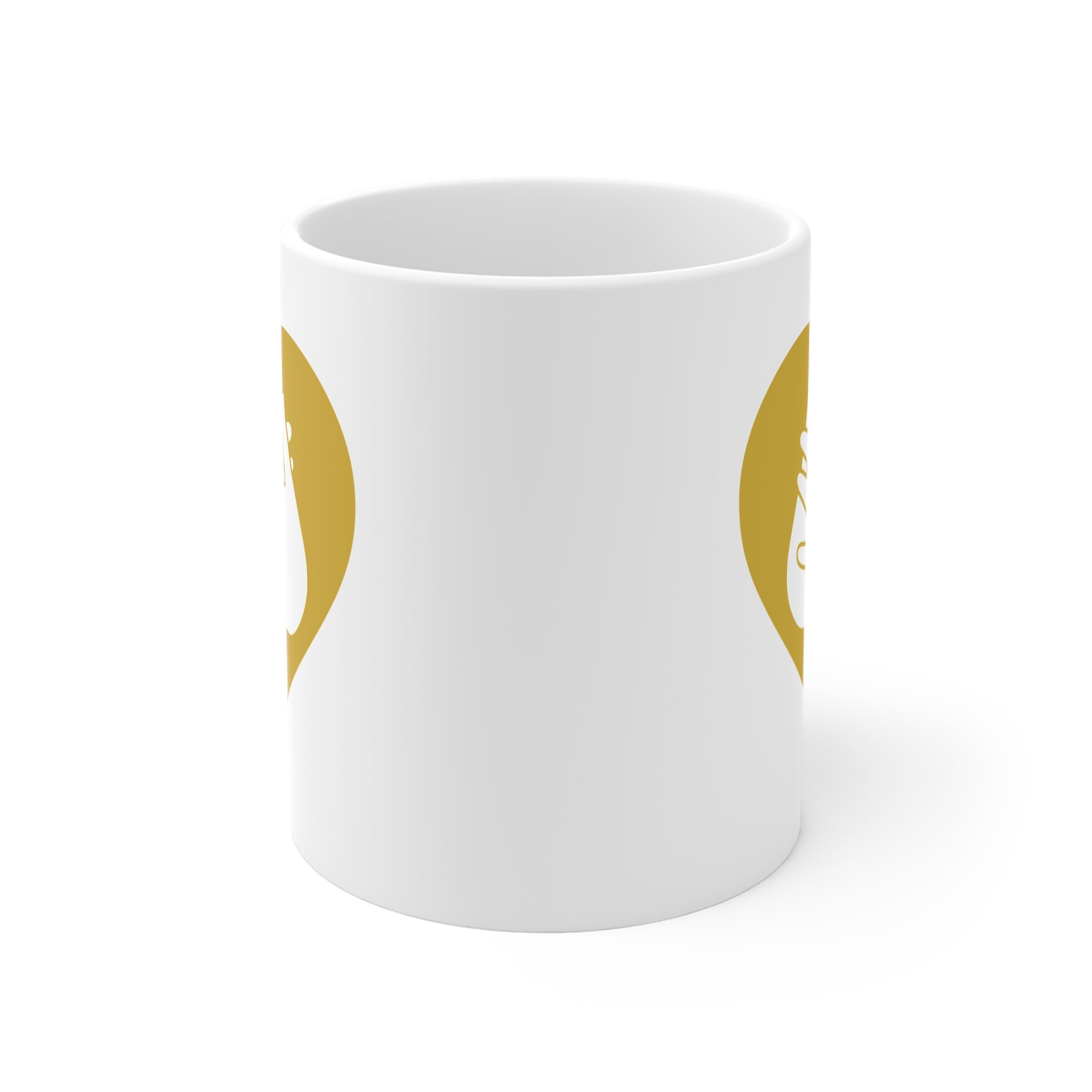 White mug with no handle visible, showing part of the gold coloured heart design on each side.