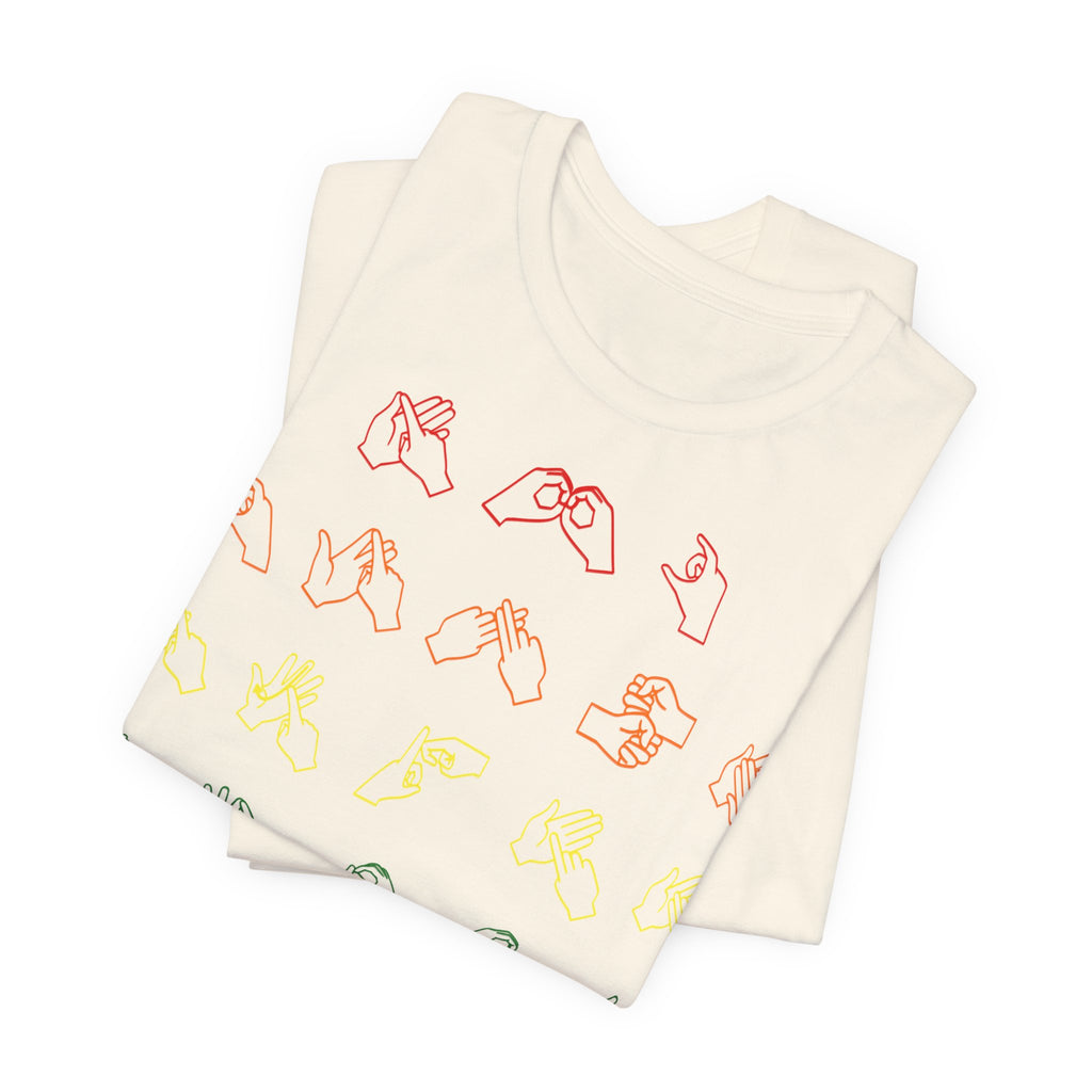 Folded natural t-shirt with BSL Alphabet - Pride Fingerspelling