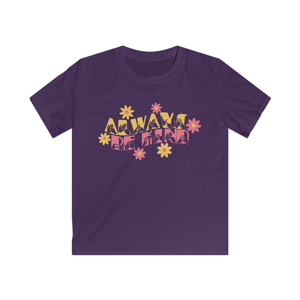Front view of a purple T-shirt featuring the phrase 'Always Be Kind' in a combination of BSL fingerspelling and text, accented with a delicate floral design.