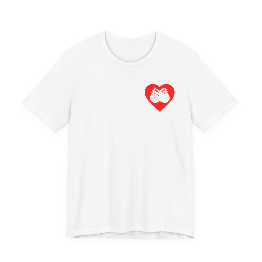 Front view of a white T-Shirt showing a red coloured heart and the iconic BSL Love sign embedded in it on the left side of the chest