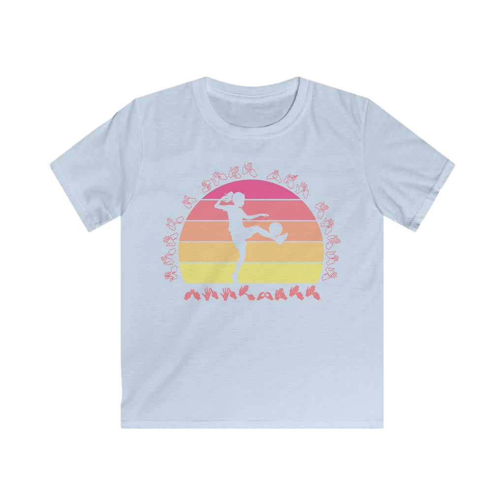 Light blue t-shirt with the phrase "Just a Girl Who Loves Football" in BSL Fingerspelling featuring a colourful retro sunset and a silhouette of a boy kicking a football.