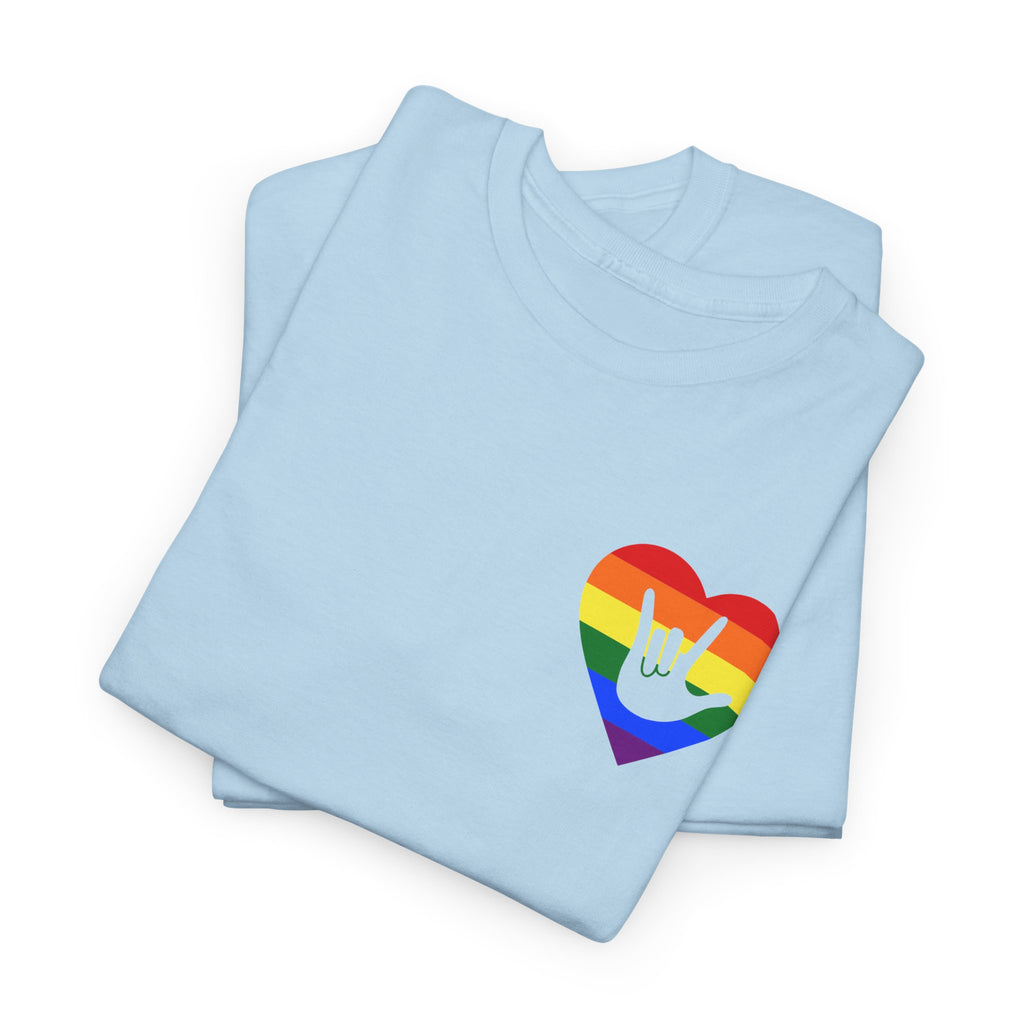 Folded light blue T-Shirt showing a pride coloured heart and the iconic ASL I Love You sign embedded in it on the left side of the chest