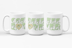 Three white mugs each showing a different angle of the phrase Coffee Lover written in BSL Fingerspelling and Text wrapping around the mug in green.