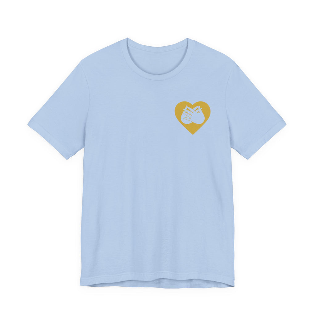 Front view of a baby blue T-Shirt showing a gold coloured heart and the iconic BSL Love sign embedded in it on the left side of the chest