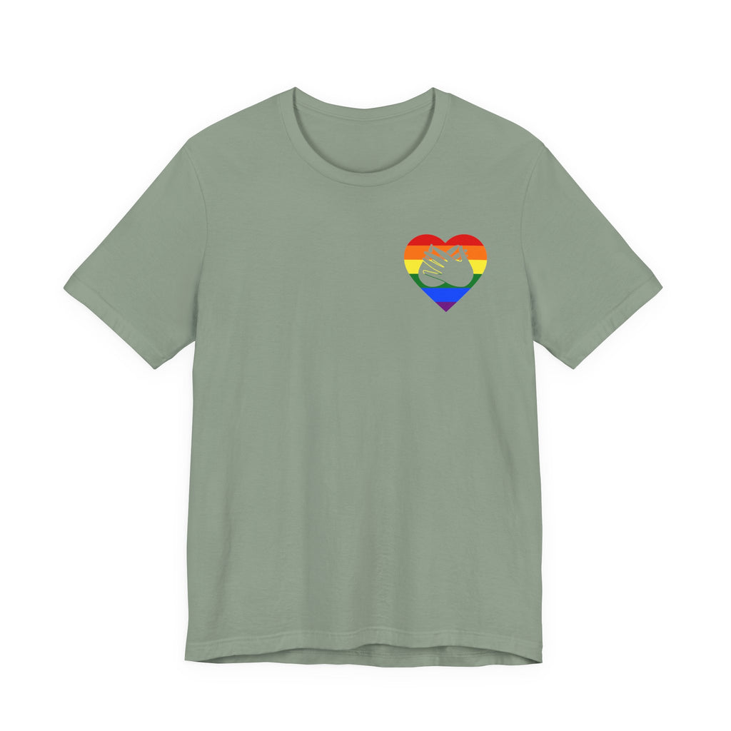 Front view of a sage T-Shirt showing a pride coloured heart and the iconic BSL Love sign embedded in it on the left side of the chest