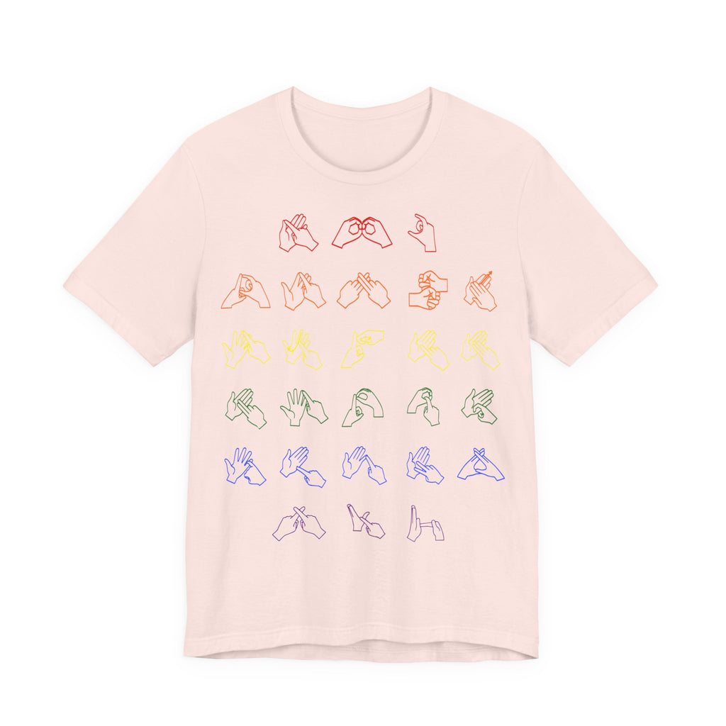 Front view of a soft pink t-shirt with BSL Alphabet - Pride Fingerspelling