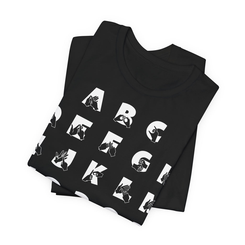 Folded black t-shirt with BSL Alphabet - White Fingerspelling & Text