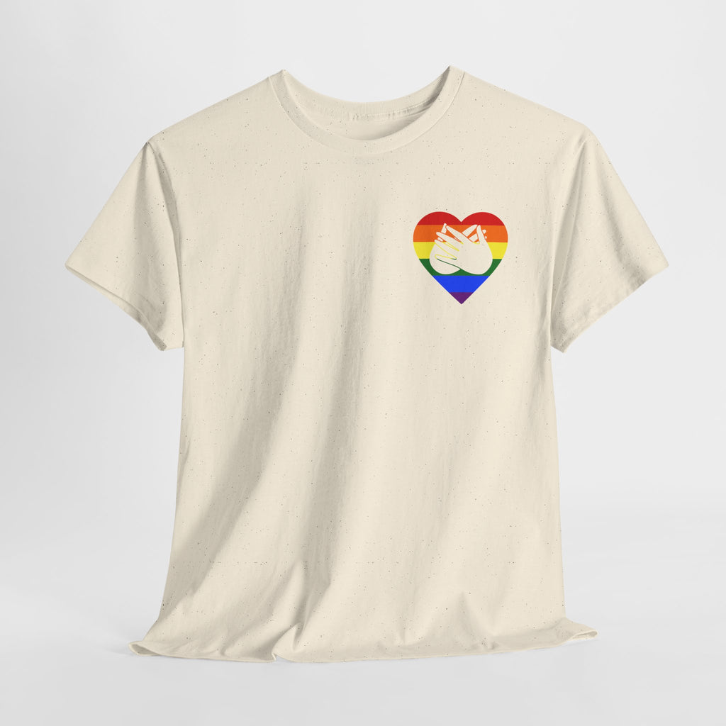 Front view of a natural T-Shirt showing a pride coloured heart and the iconic BSL Love sign embedded in it on the left side of the chest, on a light grey background