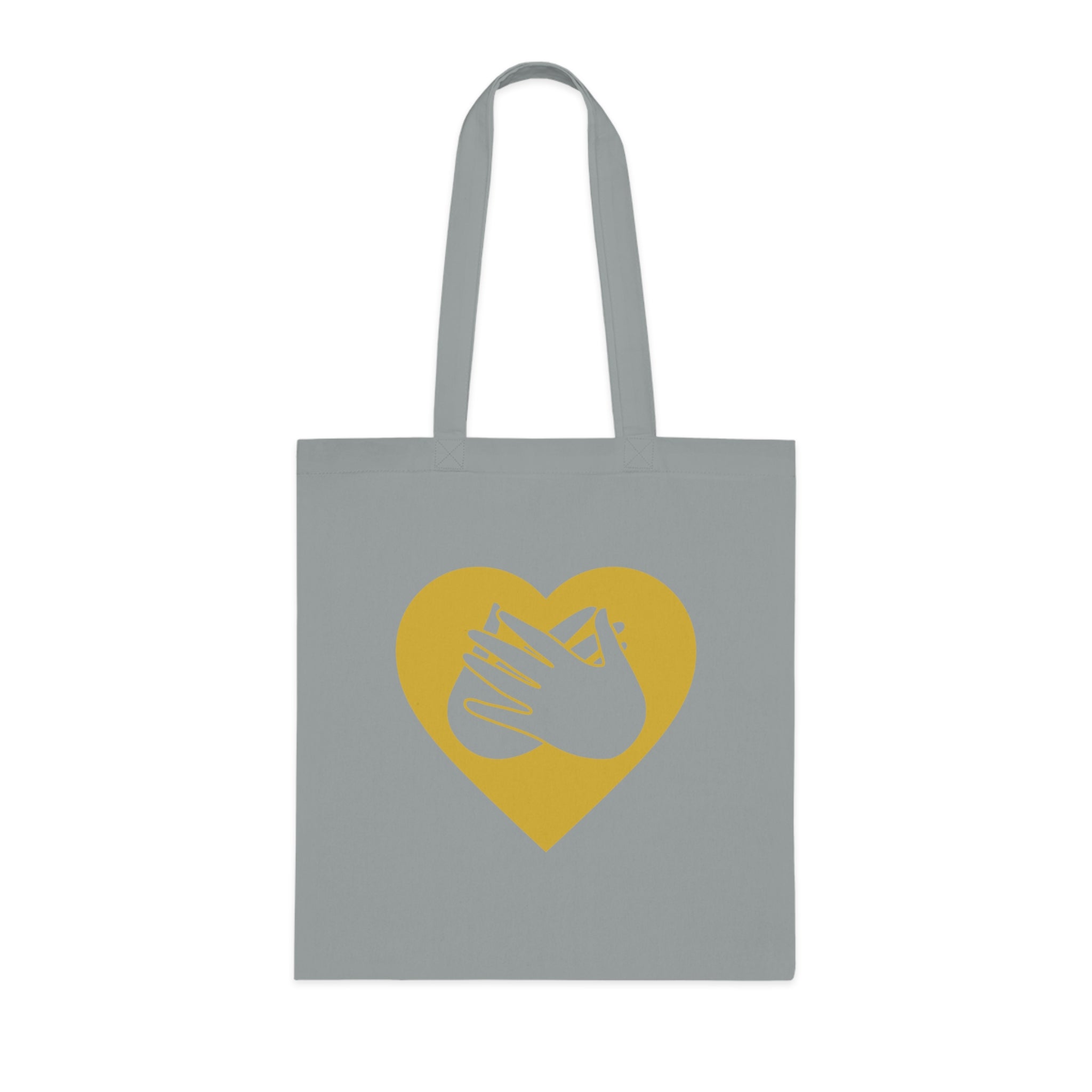 Grey Tote Bag showing a gold coloured heart and the iconic BSL Love sign embedded in it