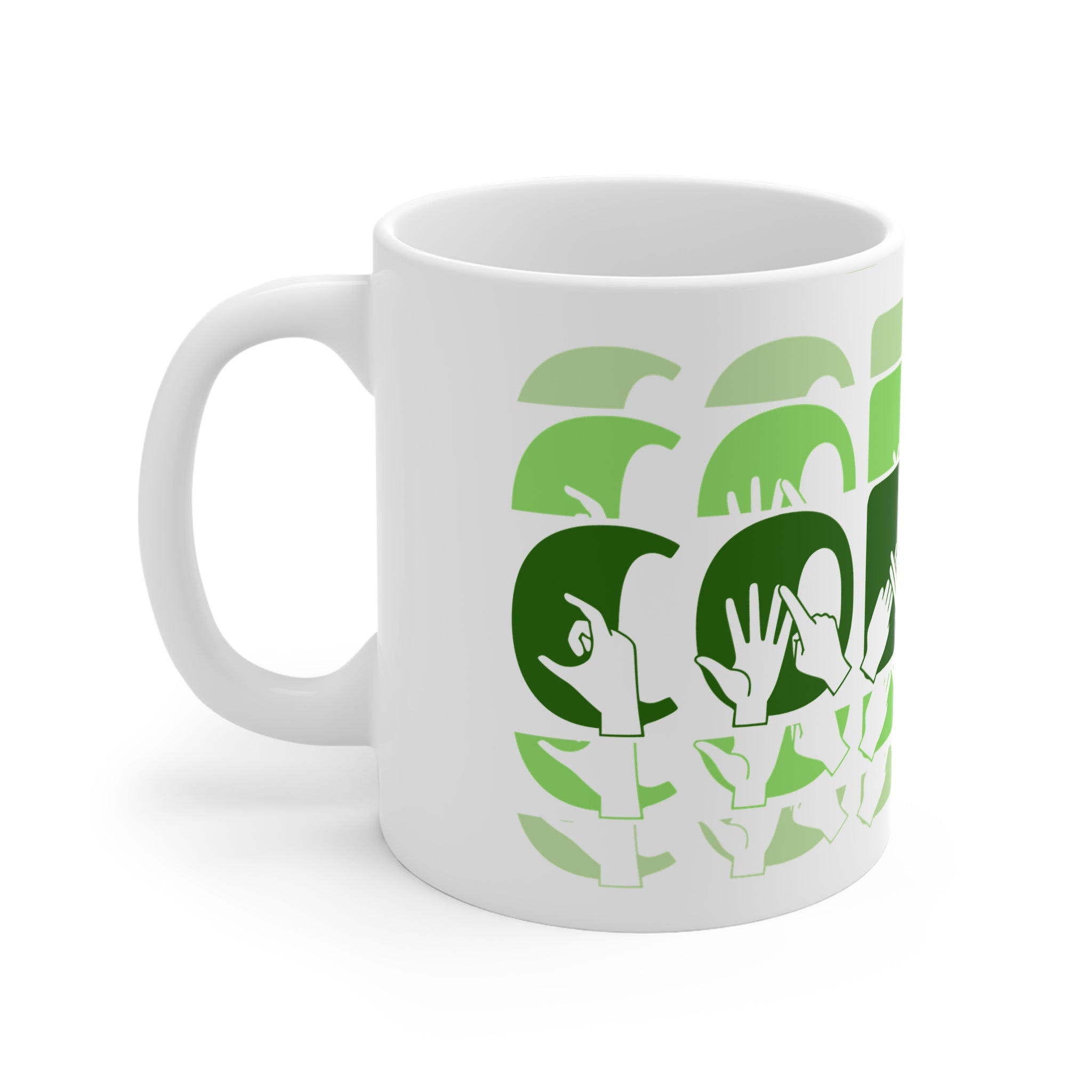 White mug featuring the phrase Coffee written in BSL Fingerspelling and Text wrapping around the mug in green cutaway design. The mug handle is on the left hand side of the mug.
