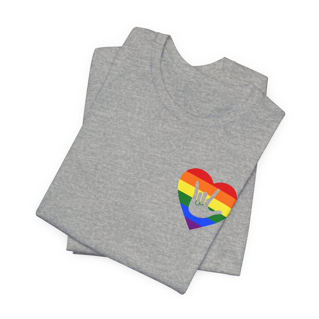 Folded athletic heather T-Shirt showing a pride coloured heart and the iconic ASL I Love You sign embedded in it on the left side of the chest