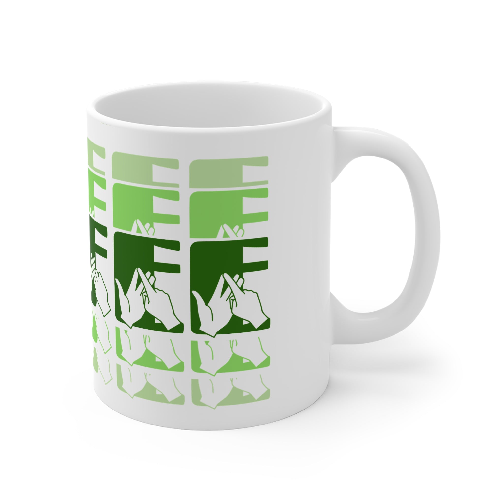 White mug featuring the phrase Coffee written in BSL Fingerspelling and Text wrapping around the mug in green cutaway design. The mug handle is on the right hand side of the mug.