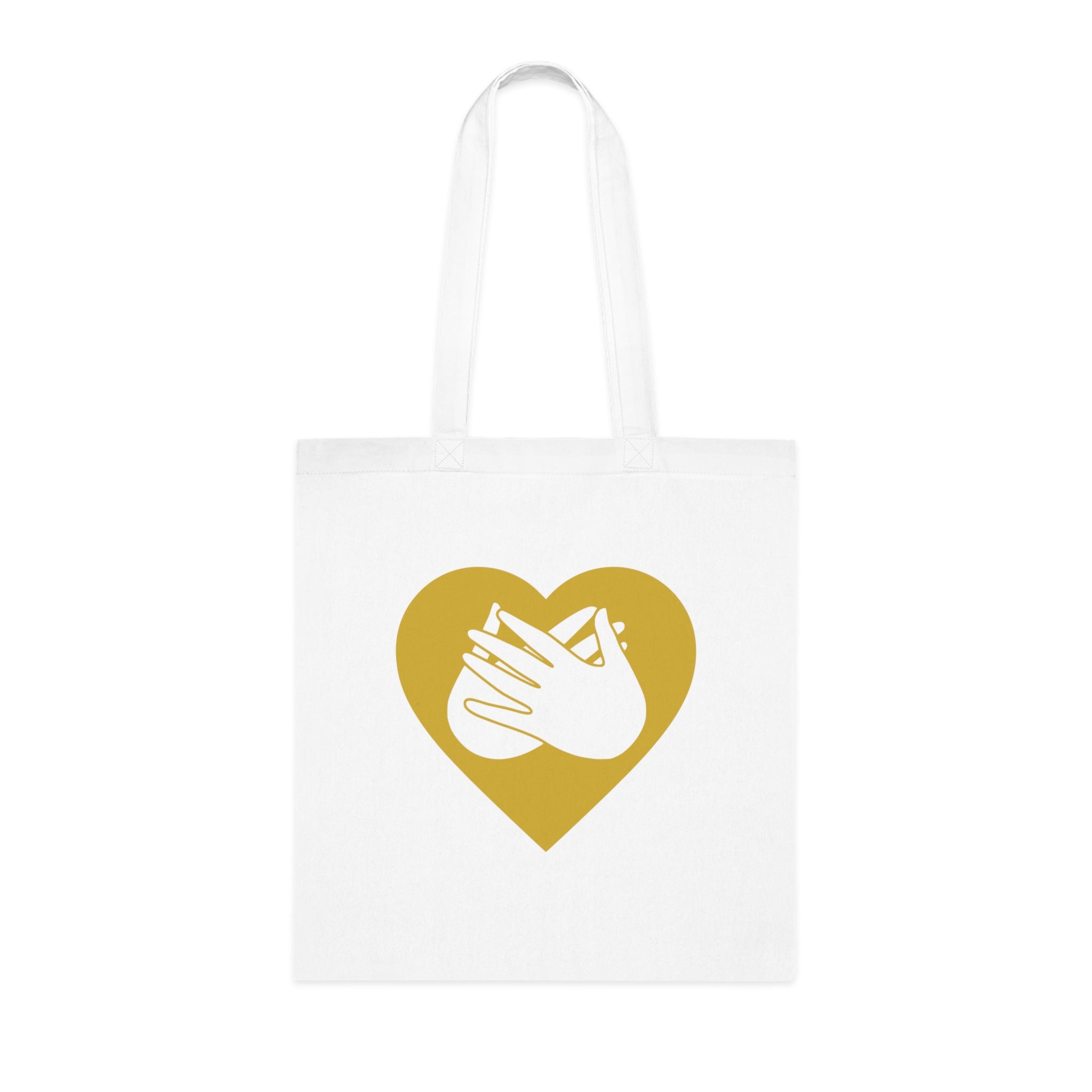 White Tote Bag showing a gold coloured heart and the iconic BSL Love sign embedded in it