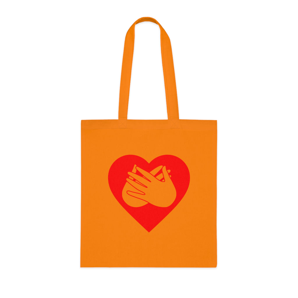 Orange Tote Bag showing a red coloured heart and the iconic BSL Love sign embedded in it