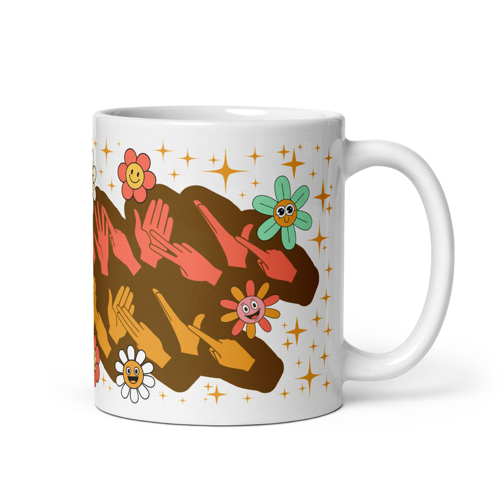 White mug showing a Groovy Mammy BSL design with the handle on the right.