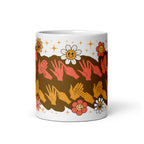 White mug showing a Groovy Mommy BSL design viewed from the front.