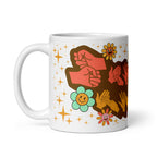 White mug showing a Groovy Mommy BSL design with the handle on the left.