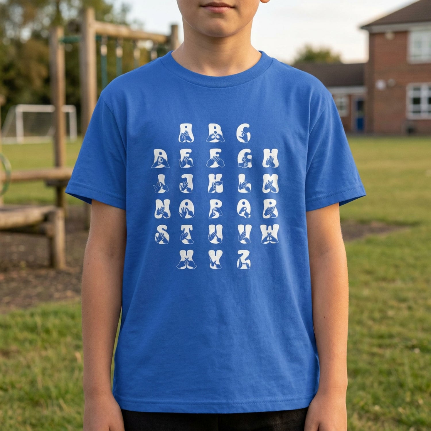 A person wearing a royal t-shirt with BSL Alphabet - White Fingerspelling & Text