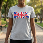 Person wearing a grey t-shirt with a Union Flag design in a park setting
