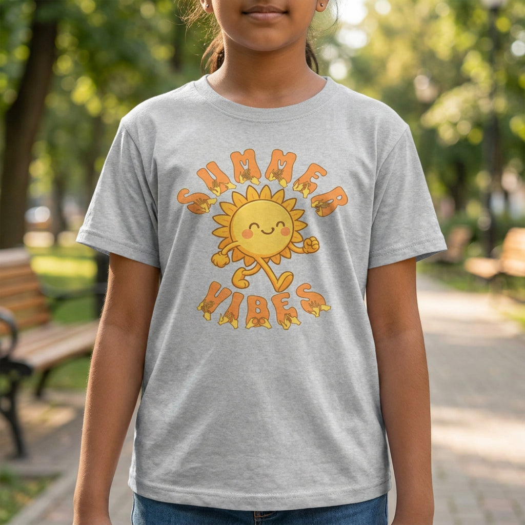 A person wearing a sport grey kids’ t-shirt with a smiling cartoon sunshine and the phrase “summer vibes” in bold textured font, each letter showing British Sign Language fingerspelling underneath.