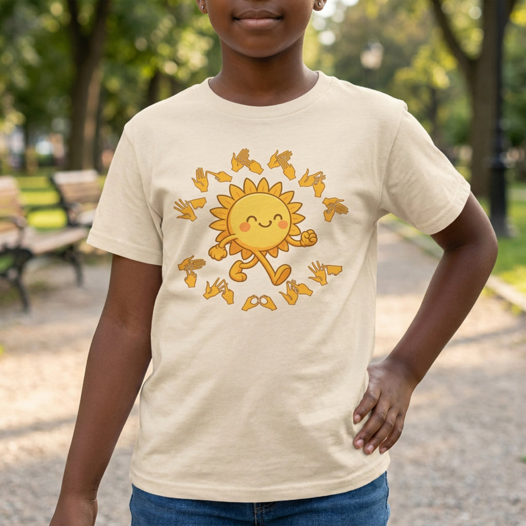 Child wearing a beige t-shirt with a sun design in a park
