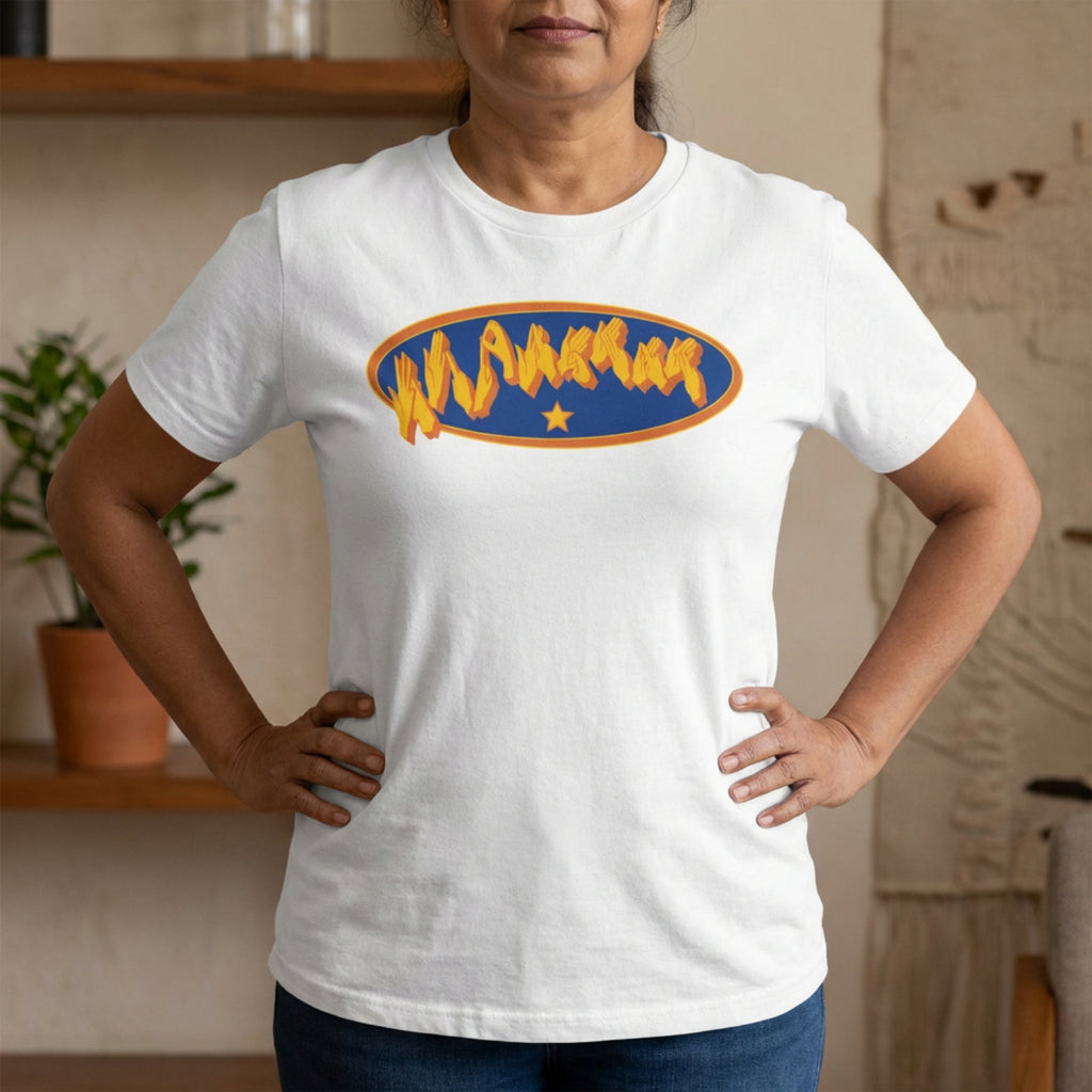 Person wearing a white t-shirt with a colorful fingerspelling logo in a casual setting