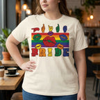 Person wearing a 'Pride' t-shirt with rainbow colors and lip prints in a casual setting.