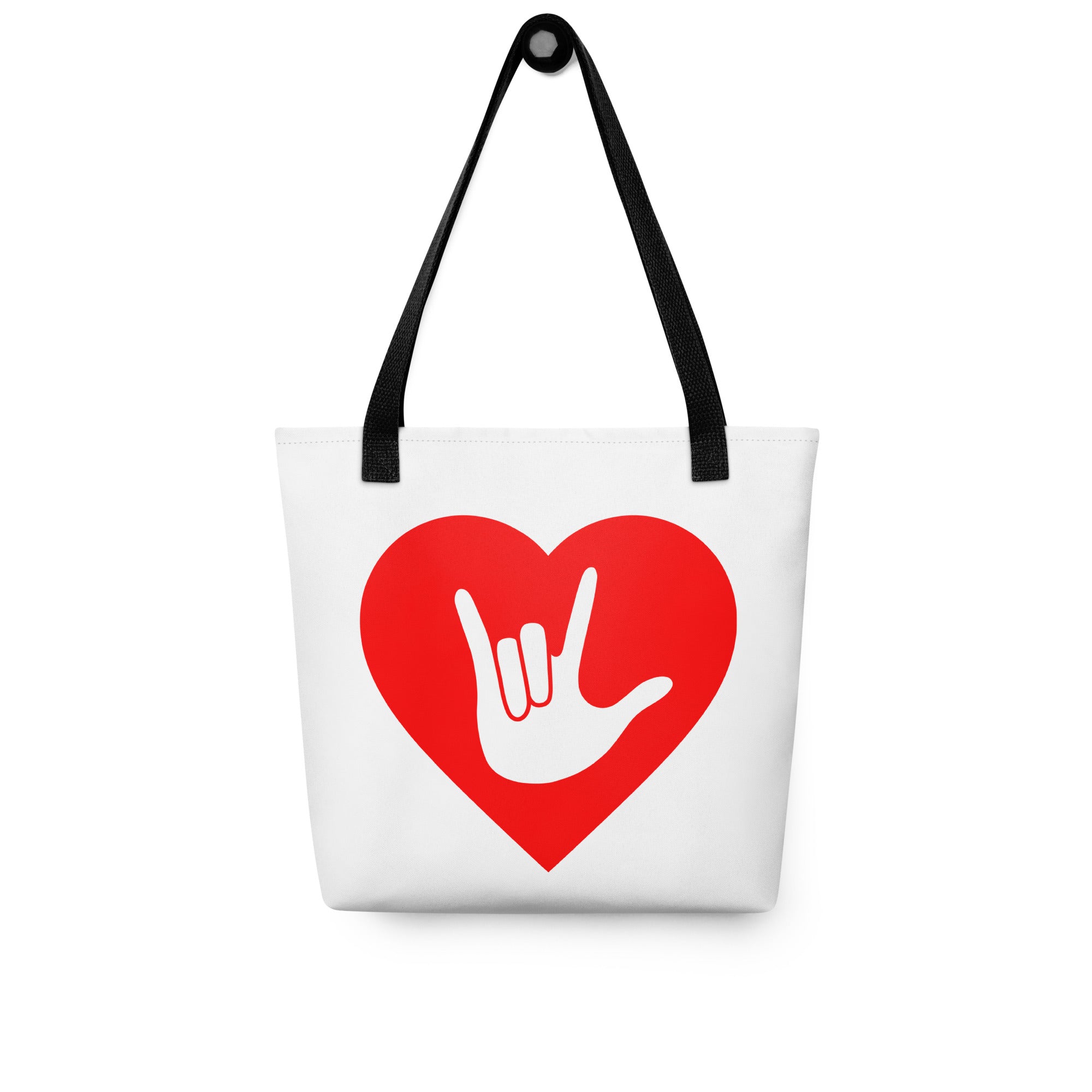 Tote bag with a black handle and a red heart with the ASL I love you sign at its center.