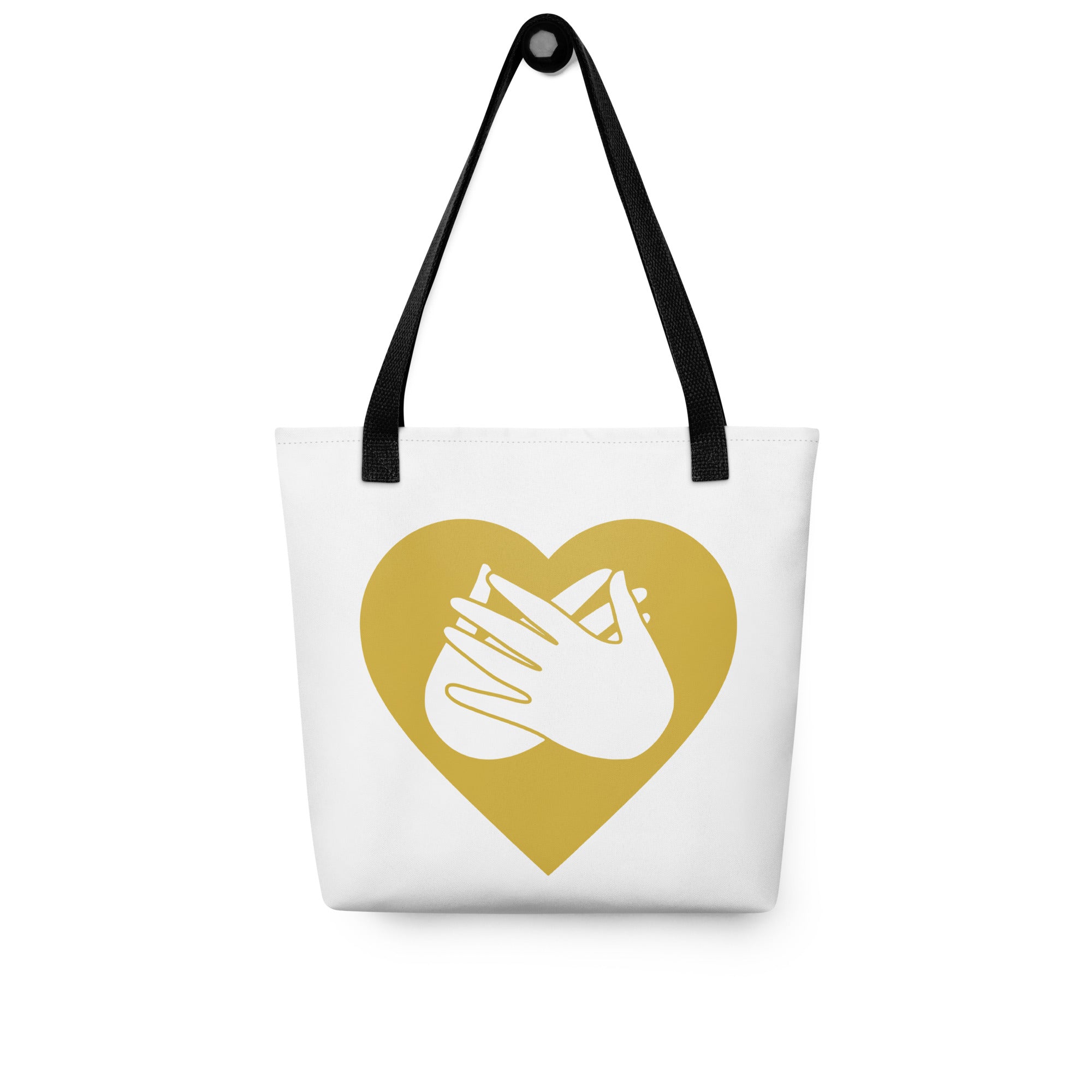 Tote bag with a black handle and a gold heart with the BSL love sign at its centre.
