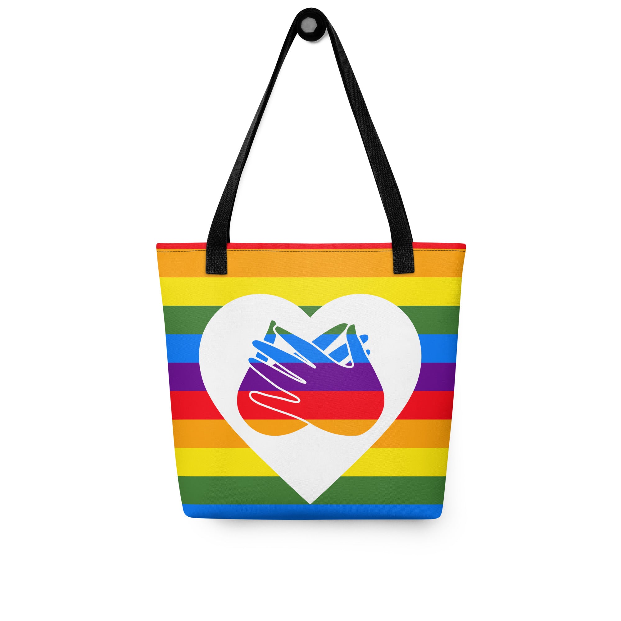 Pride rainbow coloured tote bag with a black handle and a white heart with the BSL love sign at its centre.