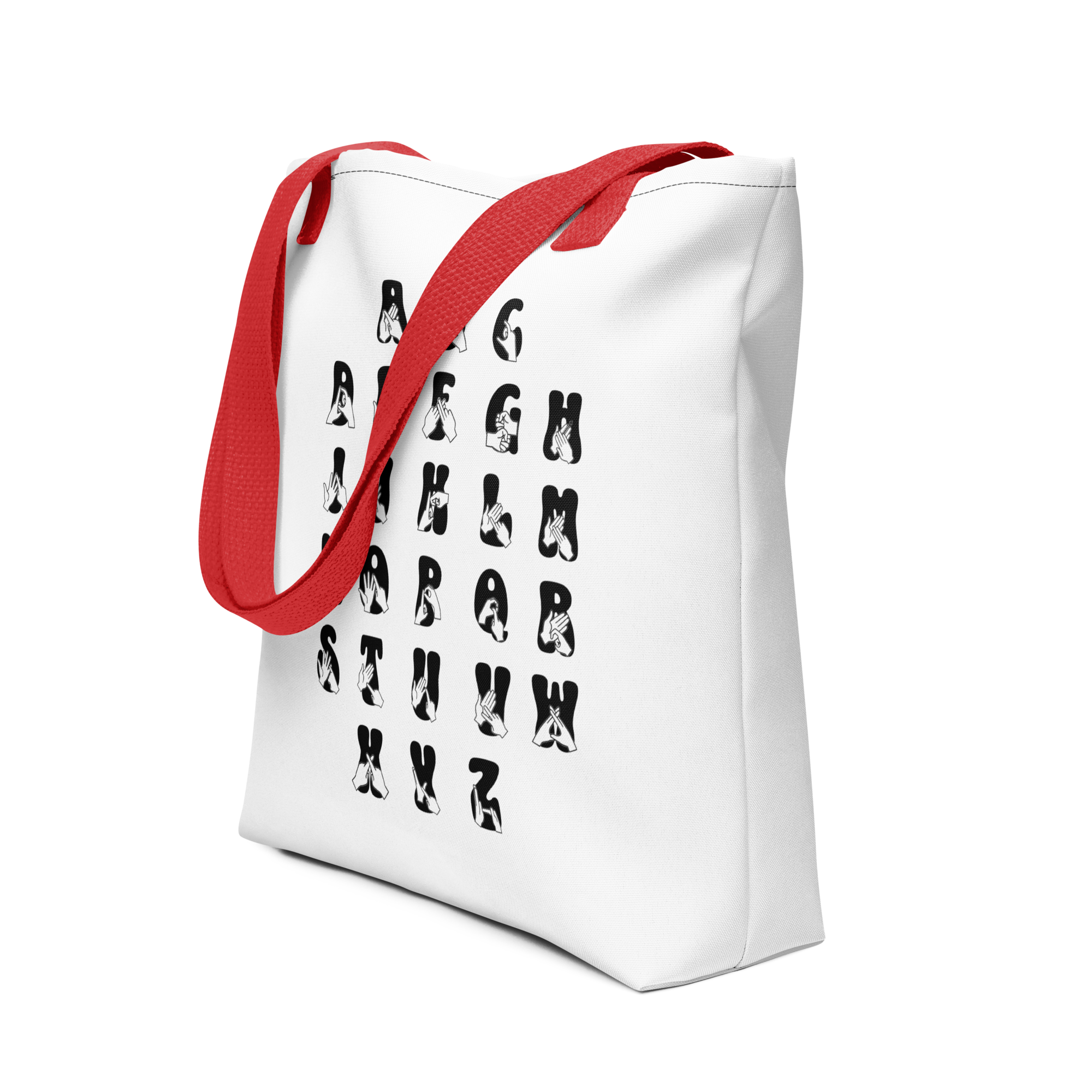 Angled view of White Tote Bag with a red handle showing BSL Alphabet - Black Fingerspelling & Text