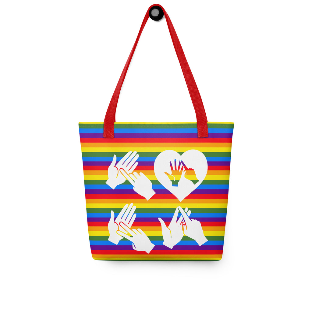 Pride rainbow coloured tote bag with a red handle and a word LOVE white BSL fingerspelling design