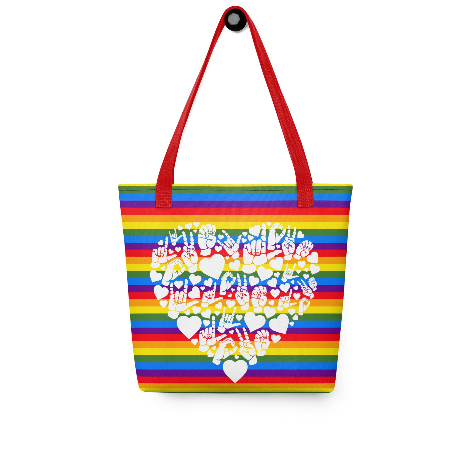 Pride rainbow coloured tote bag with a red handle and a white ASL mosaic design