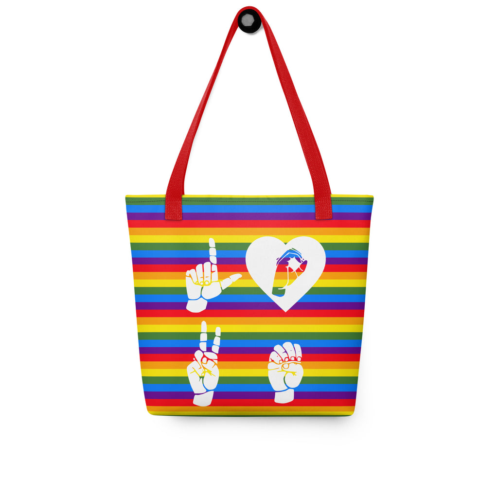 Pride rainbow colored tote bag with a red handle and a word LOVE white ASL fingerspelling design