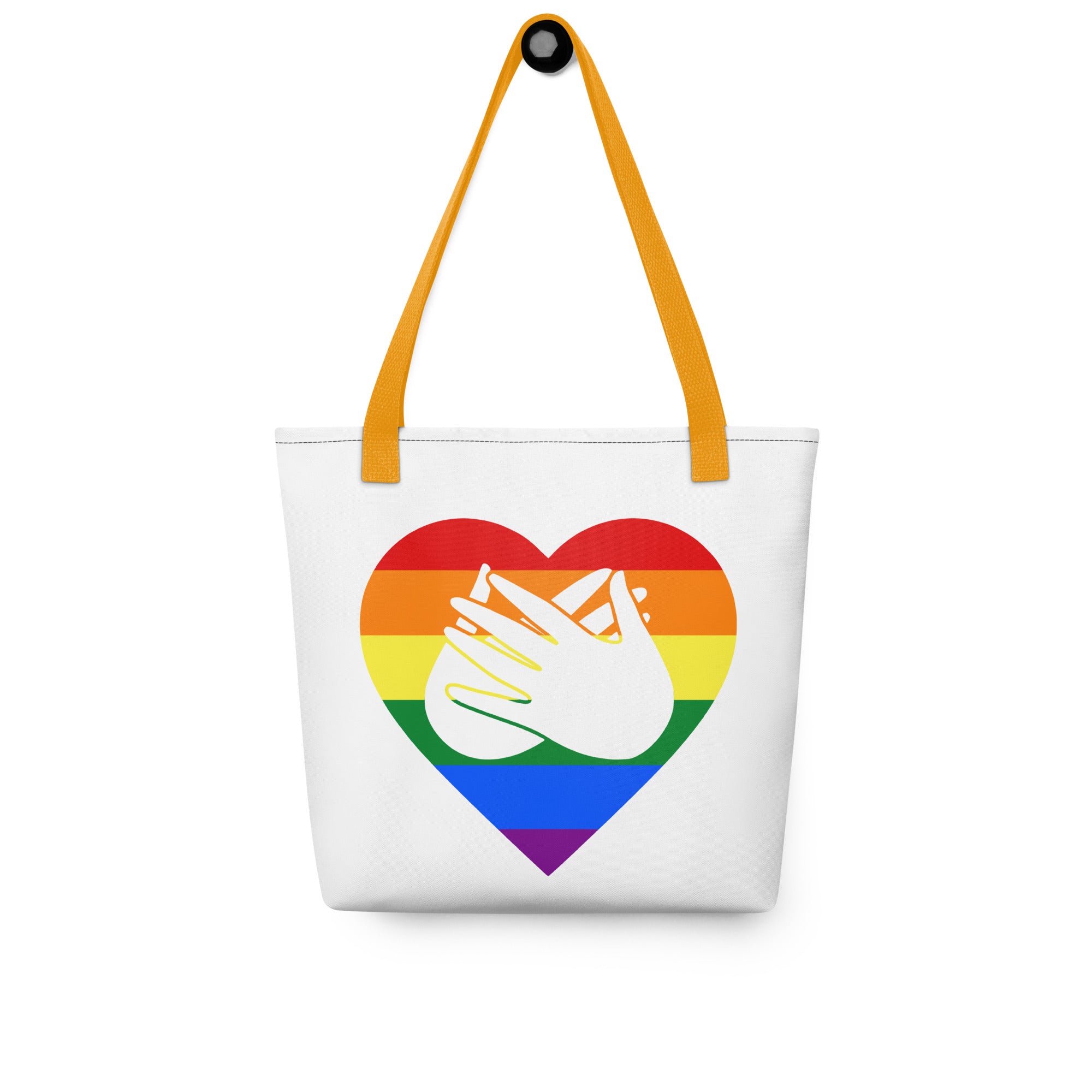 Tote bag with a yellow handle and a pride heart with the BSL love sign at its centre.