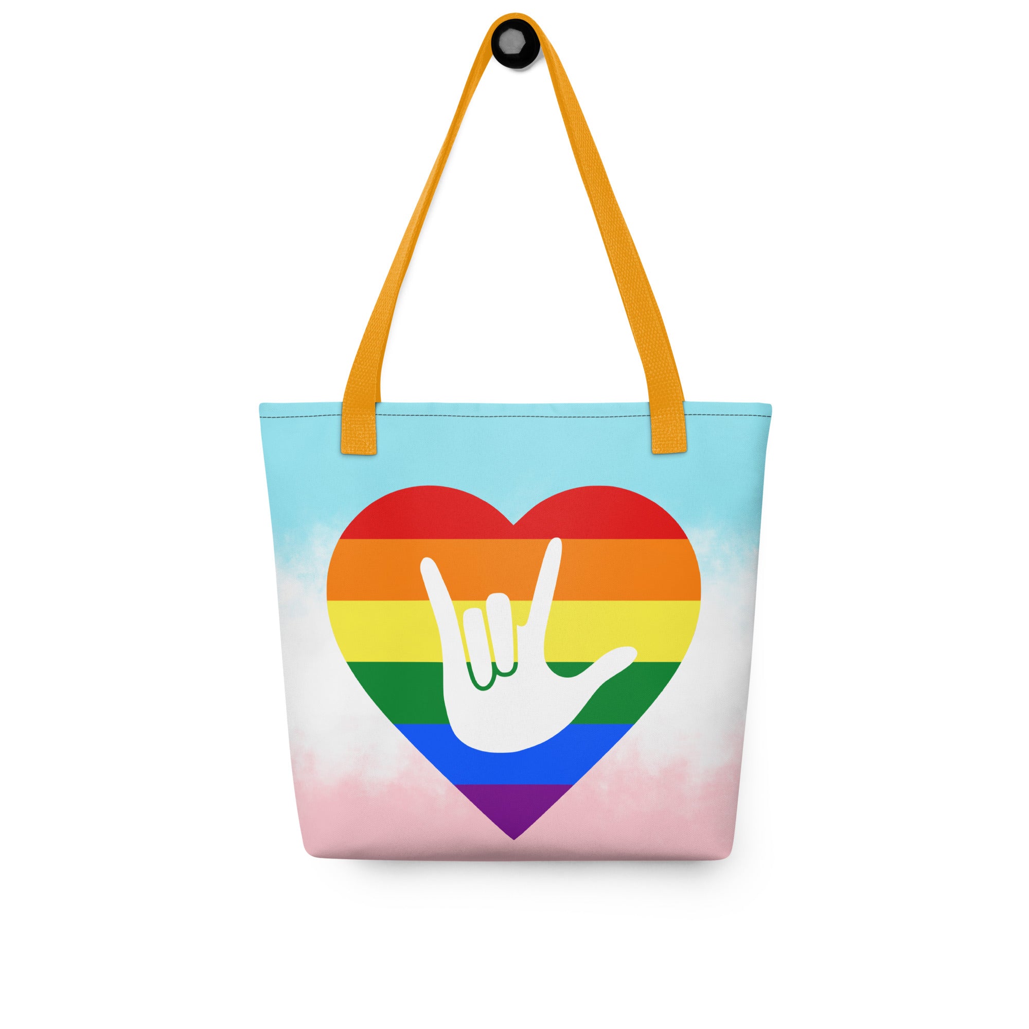 Tote bag with a yellow handle and a pride heart with the ASL I love you sign at its center.