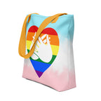 An angled view of a white Tote bag with a yellow handle and a pride heart with the BSL love sign at its centre.