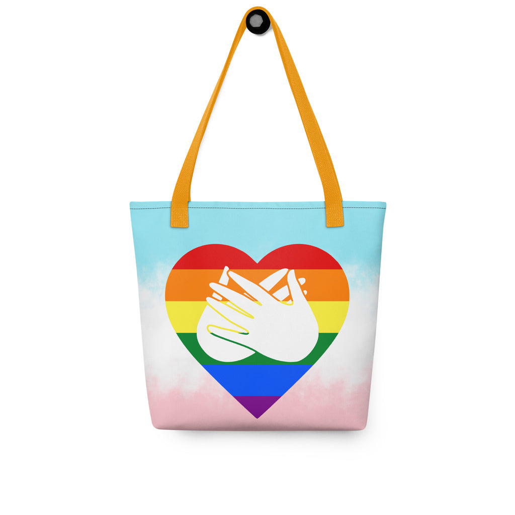 Tote bag with a yellow handle and a pride heart with the BSL love sign at its centre.