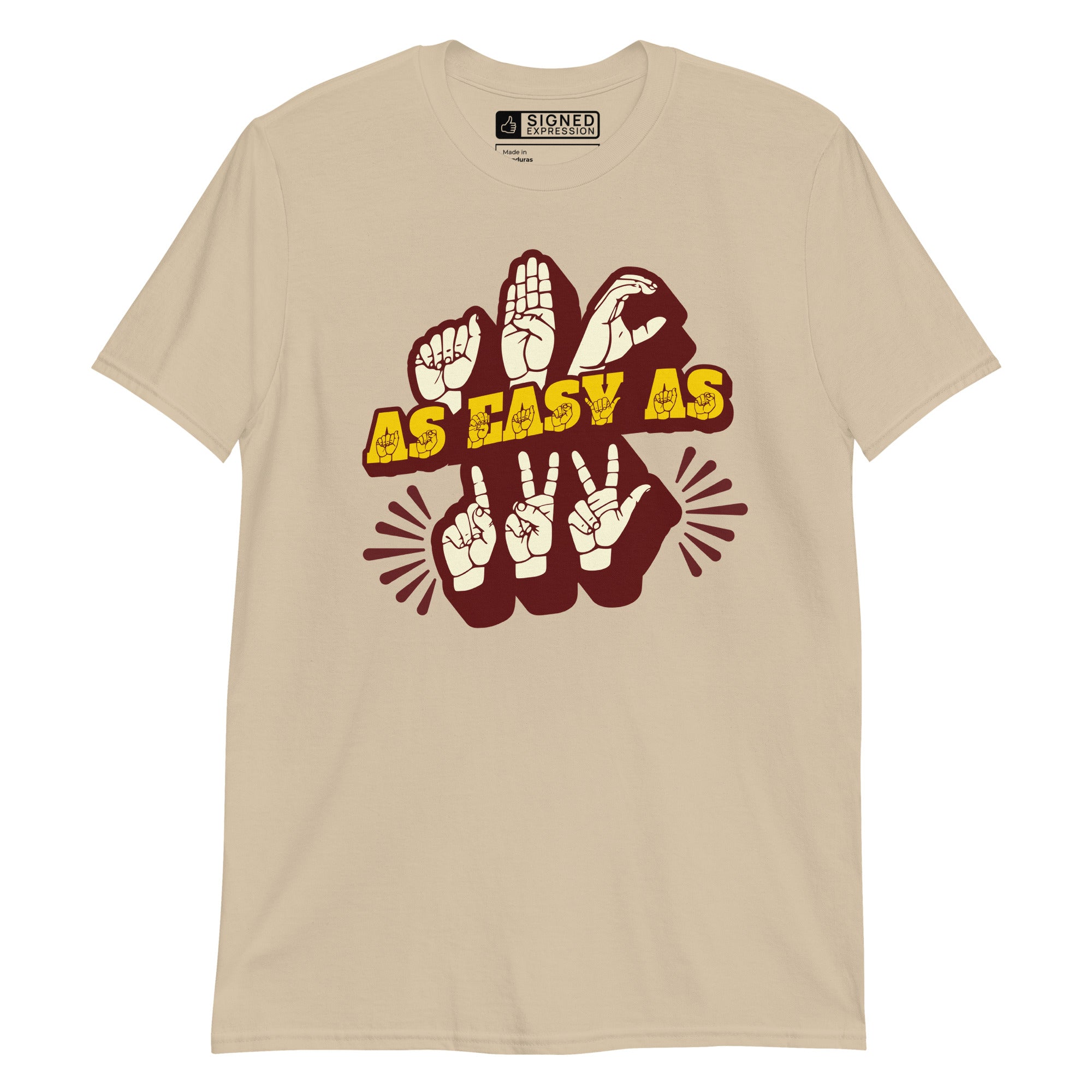 Front view of a sand t-shirt with the phrase ABC As Easy As 123 in ASL Fingerspelling & Text